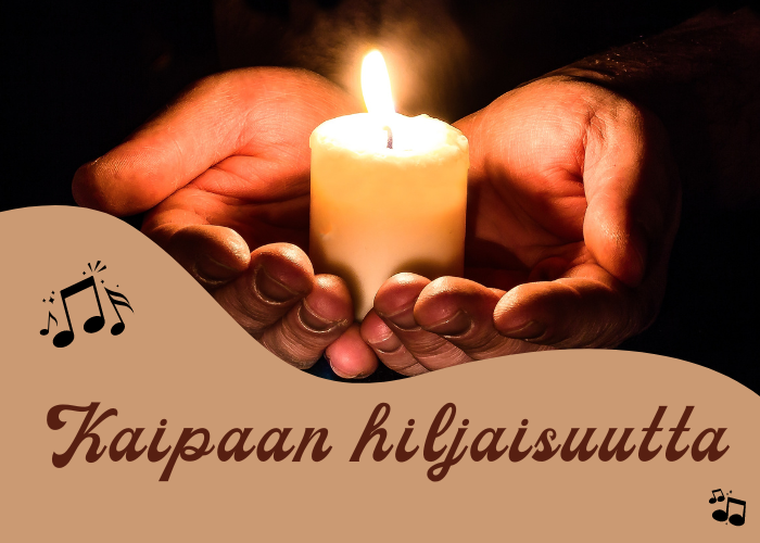 kädet kynttilän ympärillä