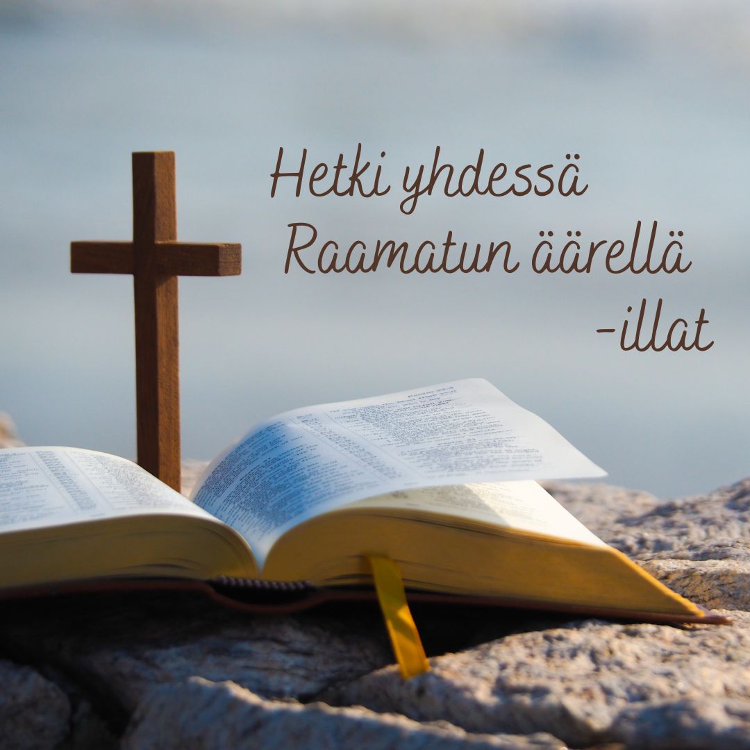 Raamattu ja risti kivellä